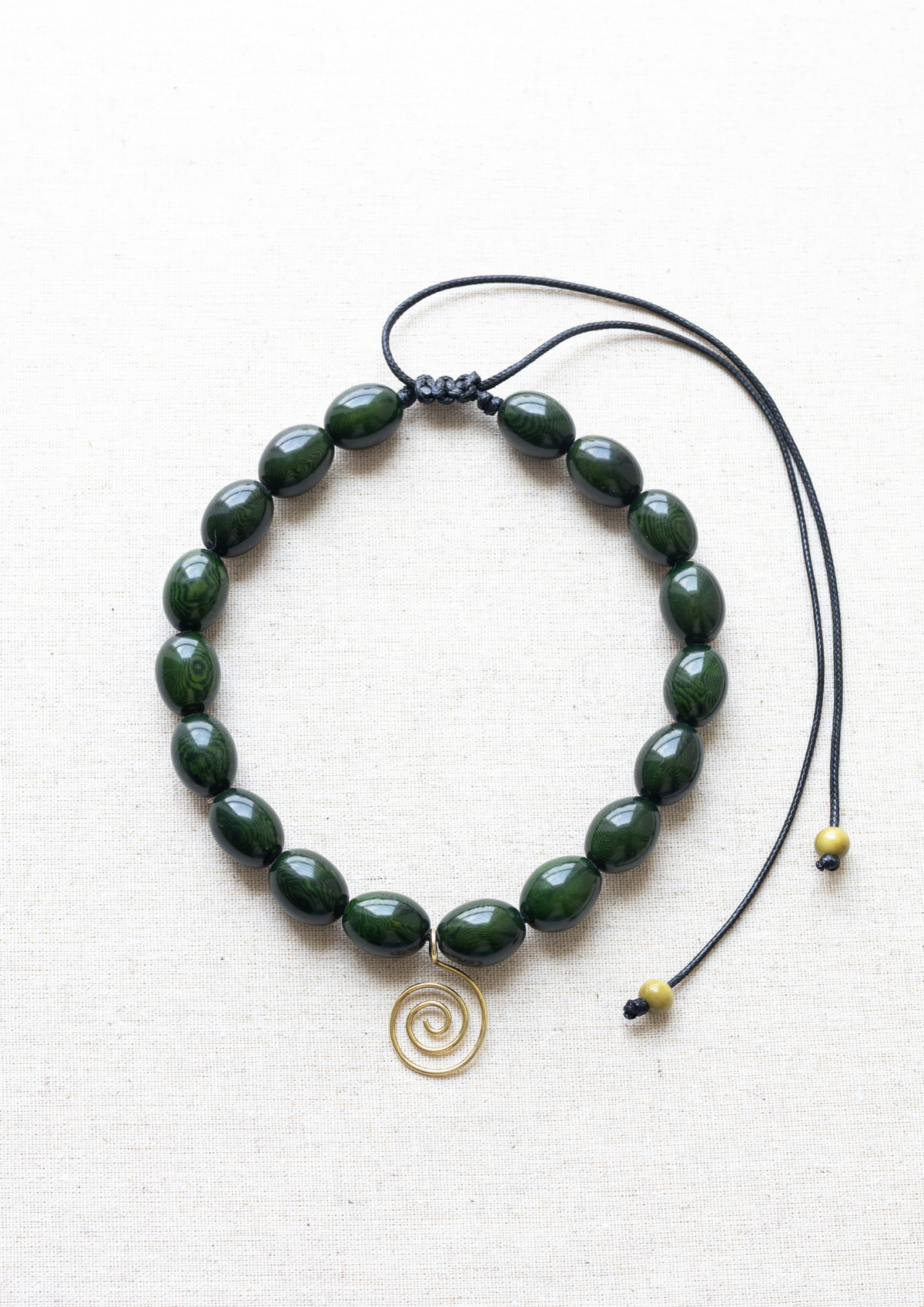 Sacred Spiral Tagua and Gold Vermeil necklace